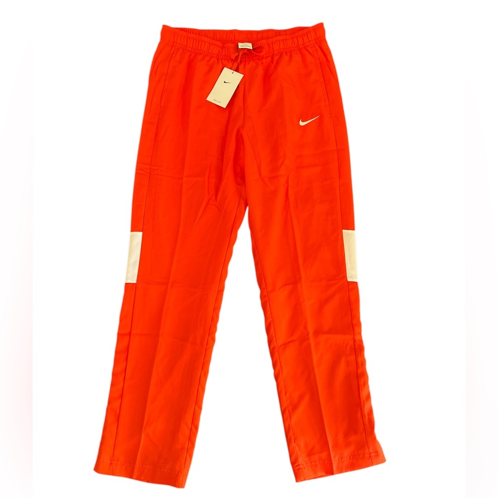 New! Women’s track pants with snap buttons on bottom of legs.  Retail $75
